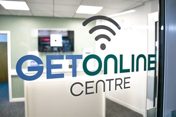 Get Online Centre logo on glass door
