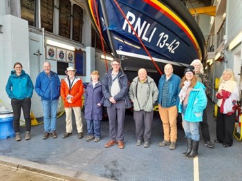 UK MAB Committee standing in front of the RNLI 13-24 boat
