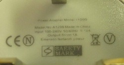 Picture of text on a counterfeit adapter (charger)