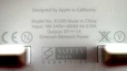 Picture of text on a genuine adapter (charger)