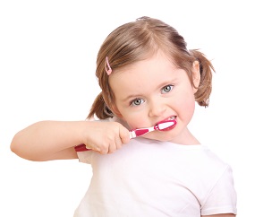 Girl Brushing her teeth