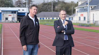 Chief Minister with the Chairman of the International Island Games Association (IIGA) Jörgen Pettersson standing on the track at the NSC during Jörgen Pettersson visit to the Island