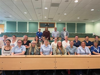 Nursing students attend badge ceremony along with Teresa Cope (Manx Care CEO), Paul Moore (Deputy Chief Executive, Executive Director of Nursing and Governance) and Paul Irving (Head of Education and School of Health)
